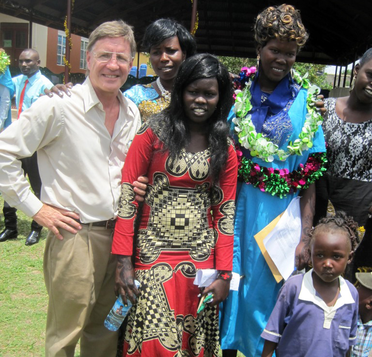 Gabe Hurrish with graduates at the April 2019 graduation ceremony for Solidarity Teacher Training College in Yambio