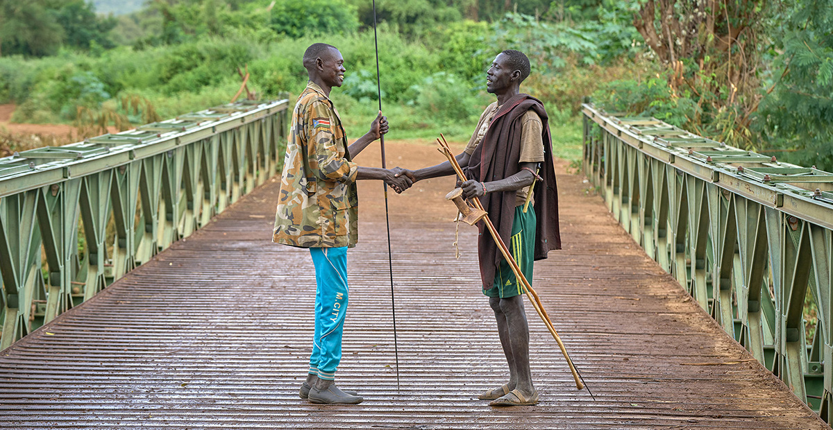 Two men on bridge in South Sudan